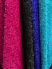 Close-up of Dear Scarlett Daydream Daze sweater's soft, fuzzy knit texture with shimmering metallic threads in four colors.