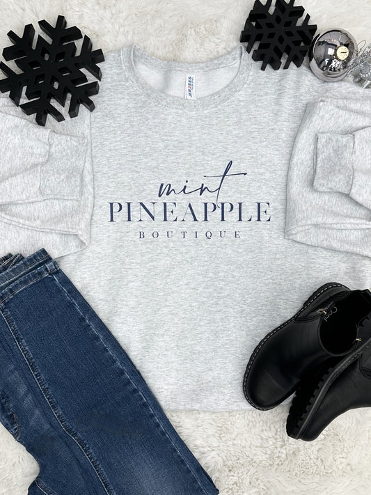 The Mint Pineapple Graphic Sweatshirt