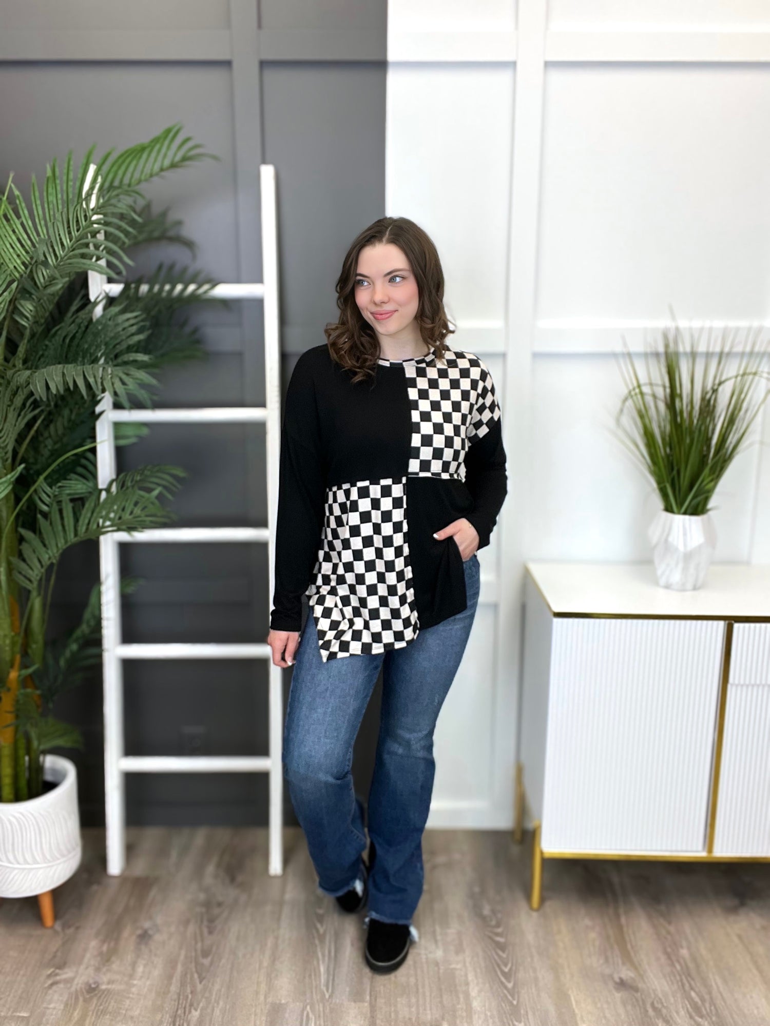 Black and white asymmetrical top store