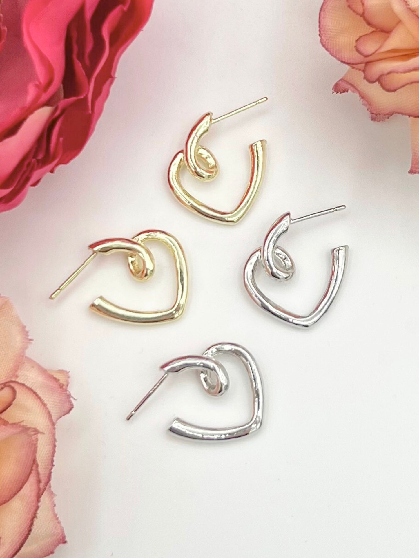 Rotating Heart Dangle Earrings