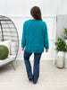 Back view of Dear Scarlett Daydream Daze sweater in Teal Glow featuring a fuzzy textured knit, long sleeves, and relaxed fit.
